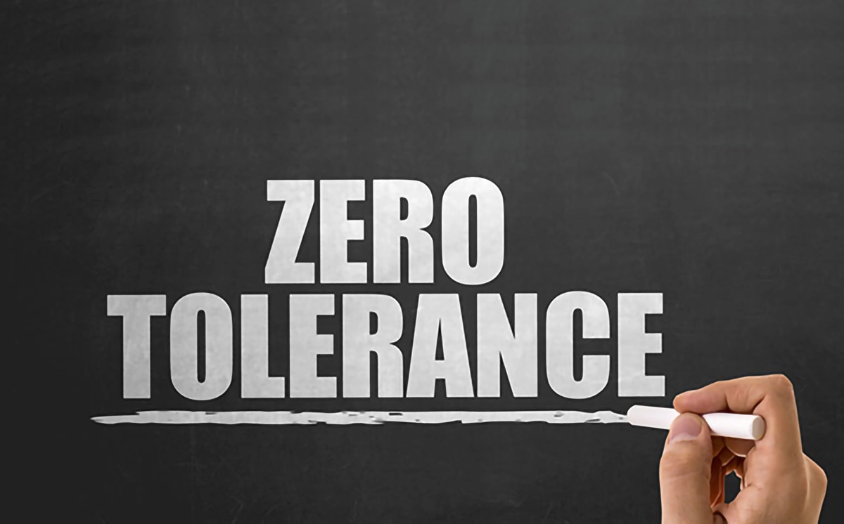 Images of a chalk board with the words Zero Tolerance inscribed